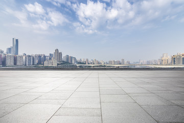 Panoramic skyline and modern business office buildings with empty road,empty concrete square floor