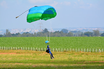 Woman parachute landing