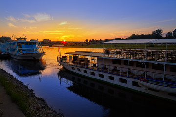 Fototapeta premium Dresden Elbe river and boats in Saxony Germany