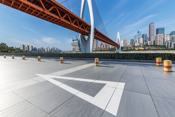 Panoramic skyline and modern business office buildings with empty road,empty concrete square floor