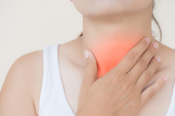 Obraz na płótnie Canvas Sore Throat. Closeup Of Beautiful Young Woman Hand Touching Her Ill Neck. Healthcare and medical concept.