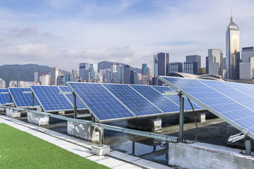 Solar and modern city skyline