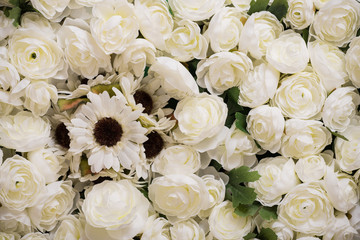 Reusable artificial flower bouquets made from cloth and plastic.