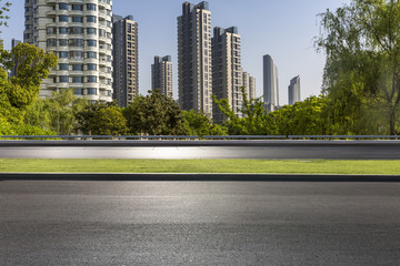 Obraz premium Modern business office buildings with empty road,empty concrete square floor