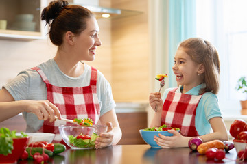 Happy family in the kitchen.