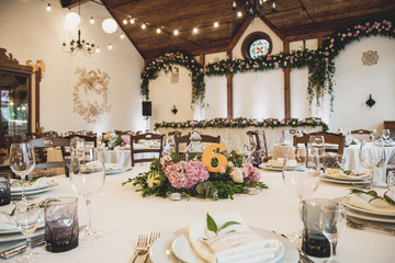 Luxury decorated dinner hall in white and brown tones