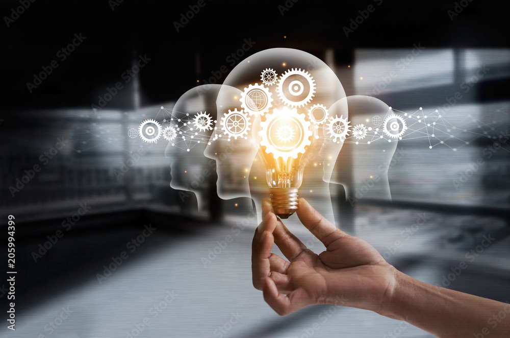Fototapete hand holding light bulb and cog inside. idea and imagination. creative and inspiration. innovation g