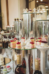 Beautiful candy bar of pink and white sweets decorated with figu