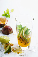 passion fruit with lime and mint leaves