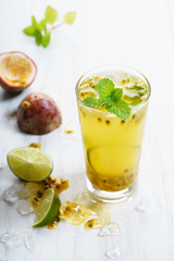 passion fruit with lime and mint leaves