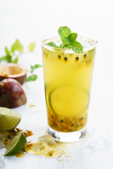 passion fruit with lime and mint leaves