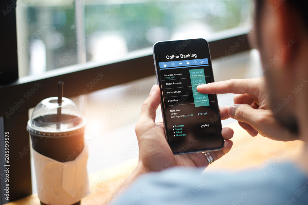 Aufkleber Mobile banking. Man using online banking technology on touch screen device. Financial and investment. Digital and internet payments shopping on network connection. All on screen are designed up.