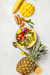 Mango banana pineapple turmeric smoothie bowl