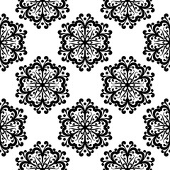 Black floral seamless pattern on white background