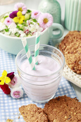 Strawberry smoothie at the breakfast table.