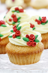 Beautiful cupcakes decorated with sugar roses.
