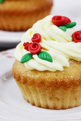 Beautiful cupcakes decorated with sugar roses.