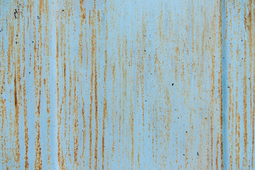 Obraz premium old scratched blue background with rust