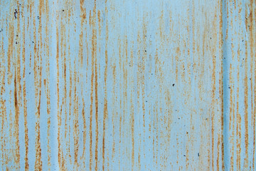 old scratched blue background with rust