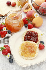 Tasty and healthy breakfast: waffles with fruit jam.