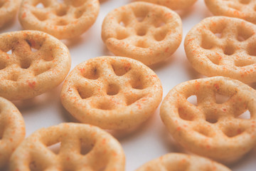Kaju Katli is a Diamond shape Indian sweet made using cashew sugar and mava, served in a plate or bowl over moody background. selective focus