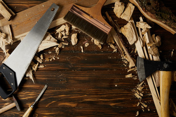 elevated view of different tools and wooden pieces on tabletop