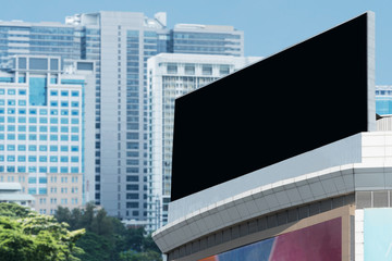 Plakat Blank billboard. Blank poster for outdoor advertising. Blank billboard with blue sky and modern building. Big blank billboard for advertisement.