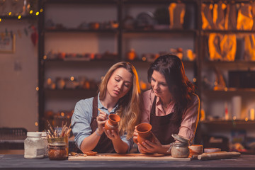 Drawing girls in a pottery
