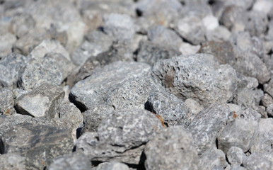 Stone crushed stone on the construction site as an abstract background
