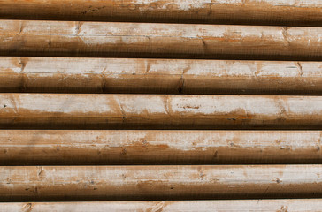 wooden background of logs