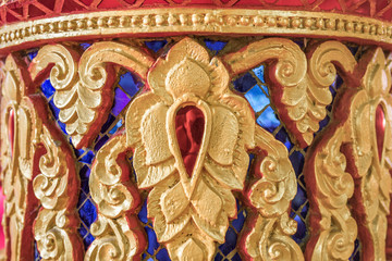 detail of beautiful decorative geometric ornaments with gemstones in Buddhist temple