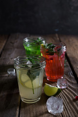 Fototapeta na wymiar Natural lemonade with fruits and herbs