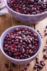 red beans dry in two bowls, selective focus