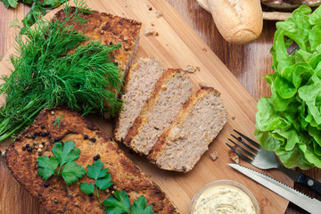 Traditional delicious meat pate with chicken liver on cutting board