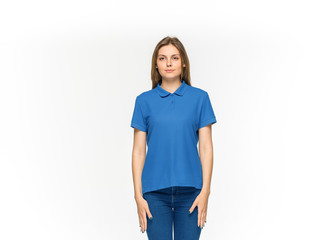 Closeup of young woman's body in empty blue t-shirt isolated on white background. Mock up for disign concept