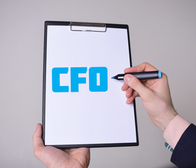A businessman shows an inscription:CFO