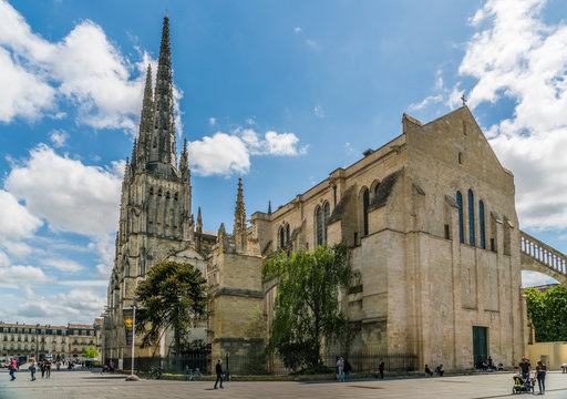 Bordeaux, France, 9 may 2018 - tourist passing the Famous Cathédrale Saint-André de Bordeaux
