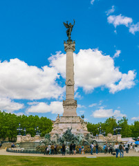 Obraz premium Bordeaux, France 10 May 2018: Tourist visiting the Famous Girondins Monument.'Monument aux Girondins' with statue's and fountain.