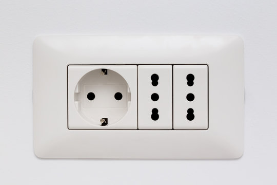 Modular socket composed by three power outlet on the wall