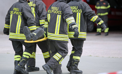 Italian firefighters rescue an injured person