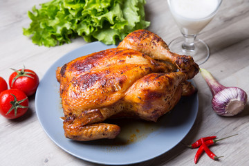 Chicken baked whole. Selective focus, close-up.