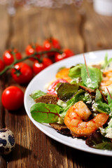 Caesar with shrimp, cherry tomatoes and quail eggs