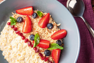 Healthy breakfast. Oatmeal with berries