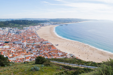 View over the funicular rails to the coast of Nazare by the Atlantic Ocean in Portugal