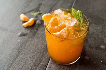 Mandarin Mojito Cocktail with Mint Leaves and Crushed Ice / Tangerine or Clementine