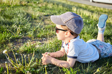 Child boy in sun glass