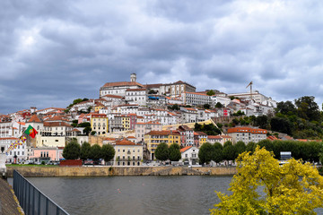Historic university hill of Coimbra from the across the Mondego River, Portugal