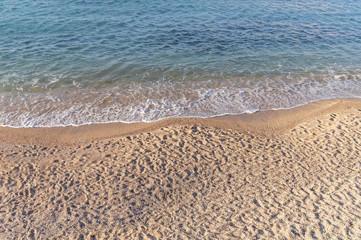 Sandy beach summer coastline with blue water