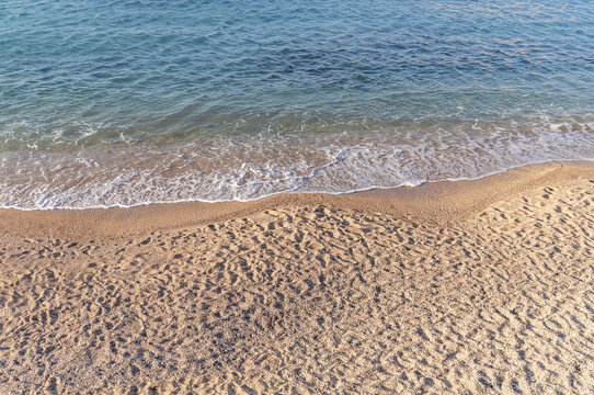 Fototapeta Sandy beach summer coastline with blue water