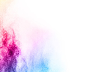 abstract powder splatted background. Colorful powder explosion on white background. Colored cloud. Colorful dust explode. Paint Holi.